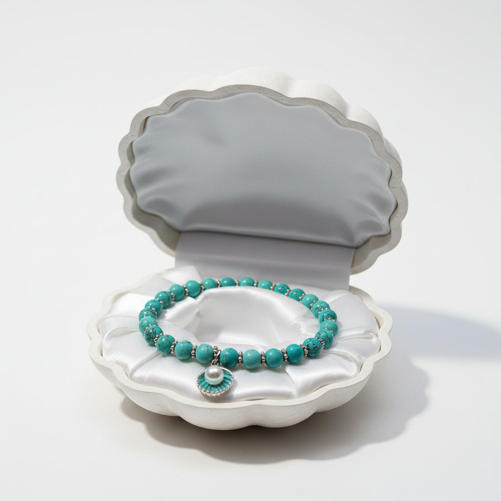 Bracelet - Turquoise Beads - Silver Spacers - and Seashell Charm with Faux Pearl