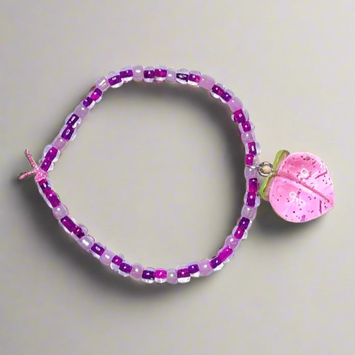 Handmade - 6" Stretch Beaded Bracelet with Pink Peach Charm