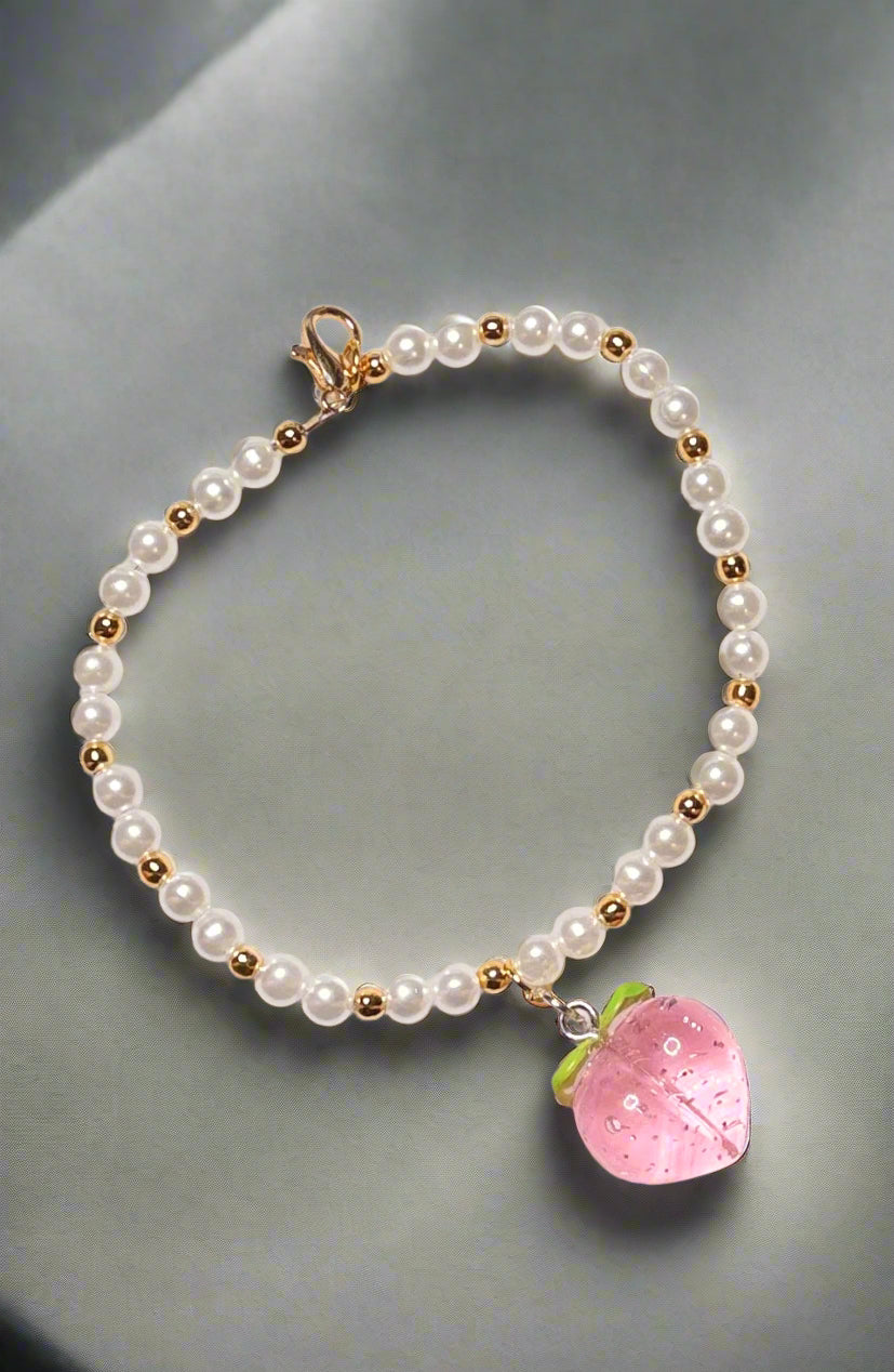 Handmade - 8" Pearl Like Beaded Bracelet with Peach Charm