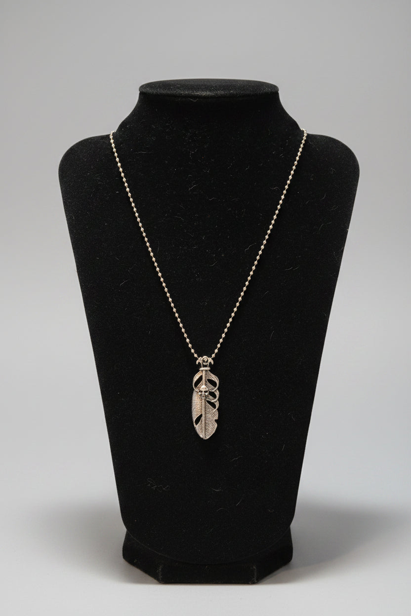 Necklace - Feather Shaped Pendant with Skull Motif