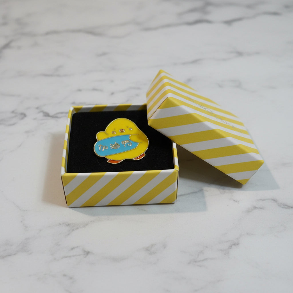 Lapel Pin - Yellow Chick Holding Blue Sign