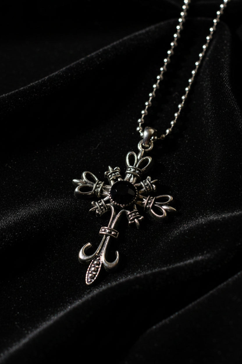Necklace - Silver-Toned Fleur De Lis Cross featuring a Striking Black Gem