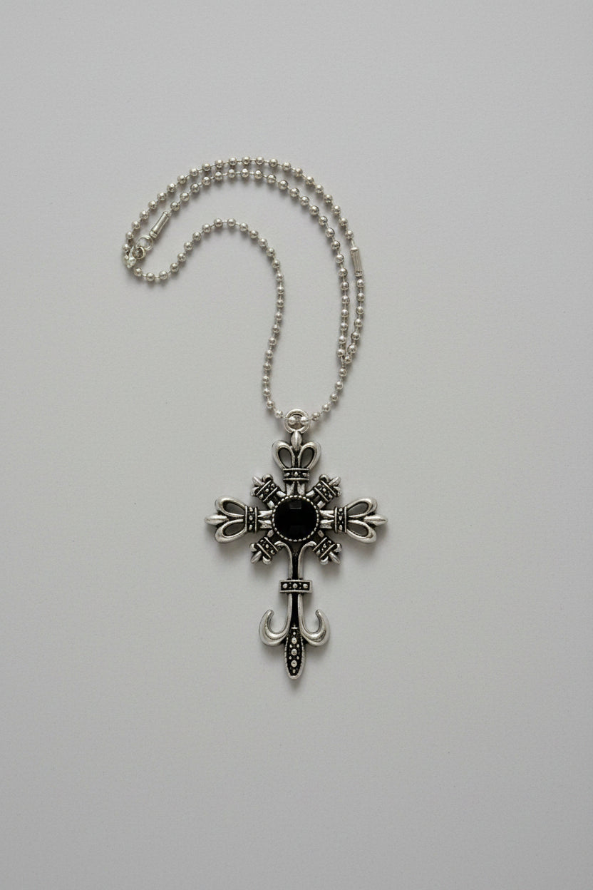 Necklace - Silver-Toned Fleur De Lis Cross featuring a Striking Black Gem