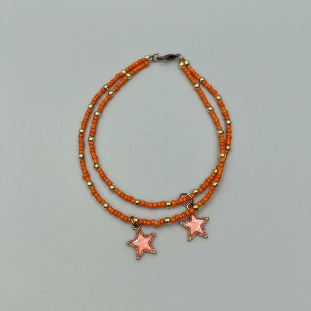 Bracelet - Double Strand - Orange Seed Beads - with Two Star Charms