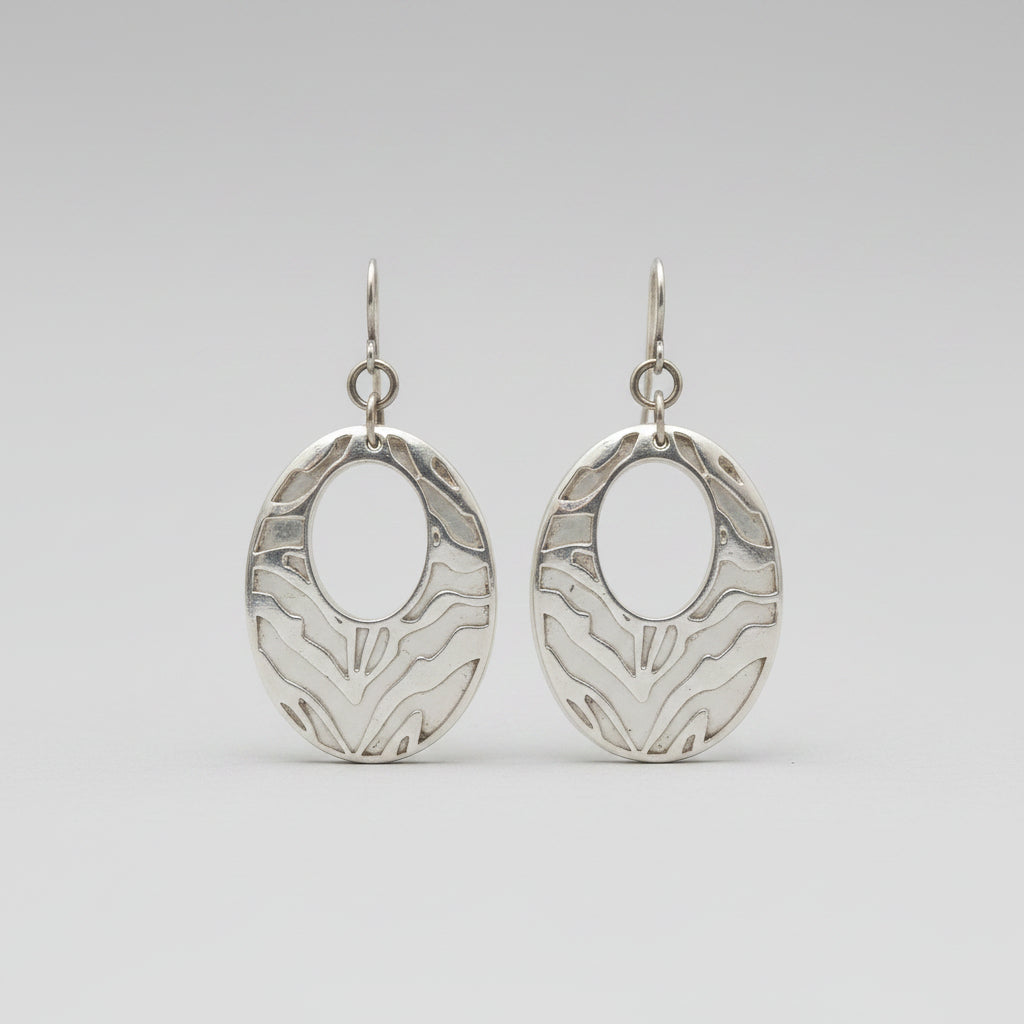 Earrings - White with Silver Tone Cutout Animal Print Oval - Dangle