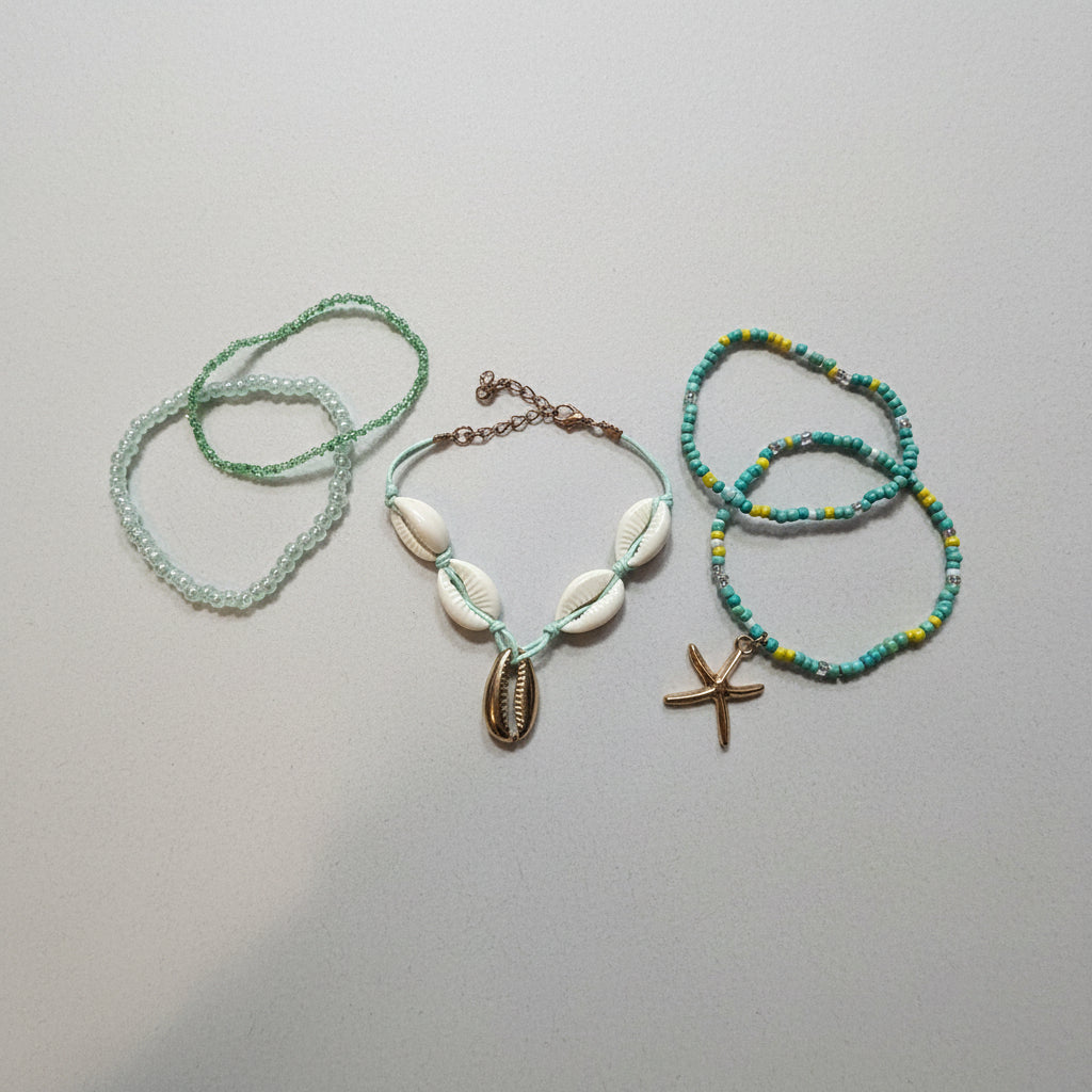 Bracelet - Light Green, Vibrant Blue, Yellow Seeded Beads - with Cowrie & Starfish Charms