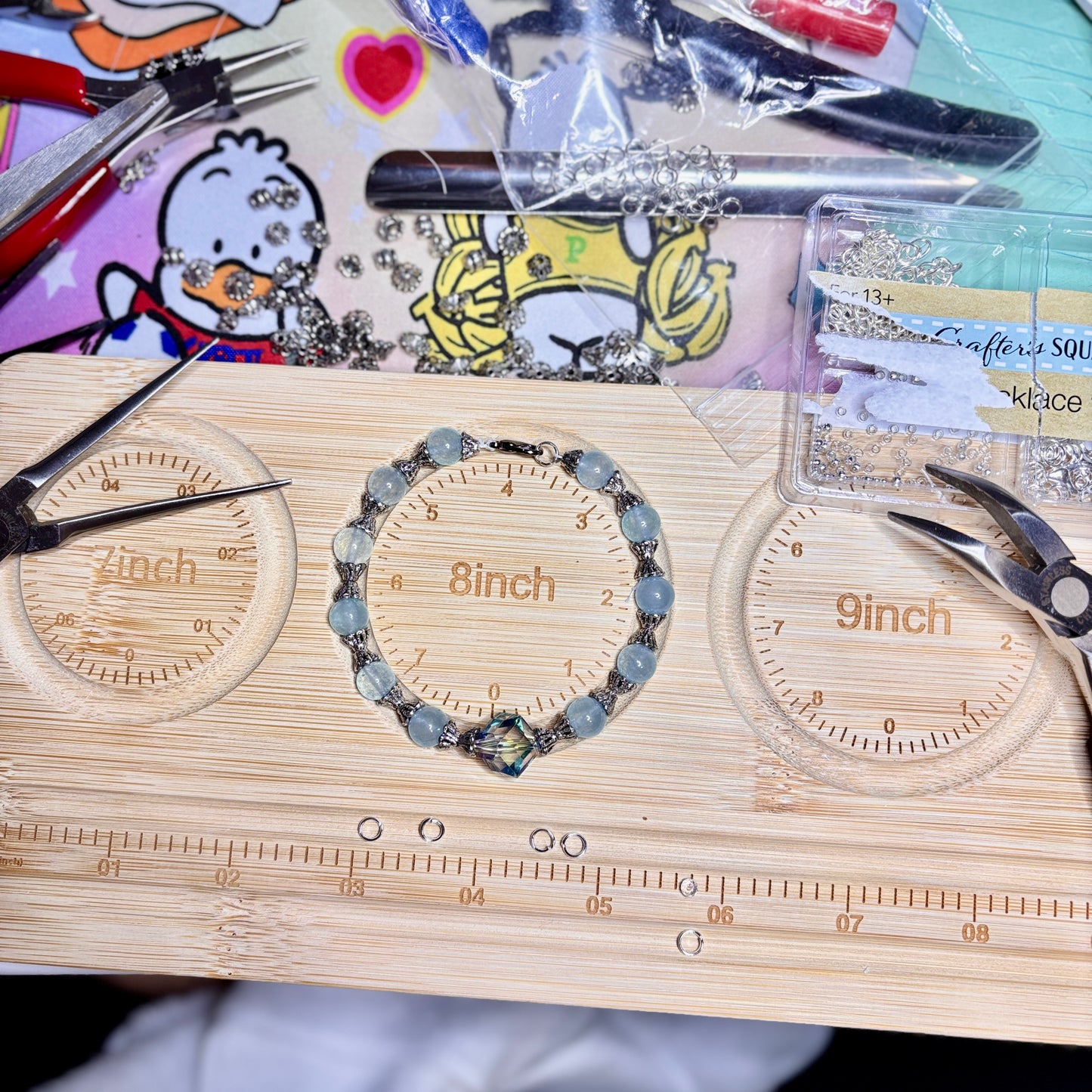 Handmade - Powder Blue Beaded Bracelet with a Center Faceted Blue Crystal