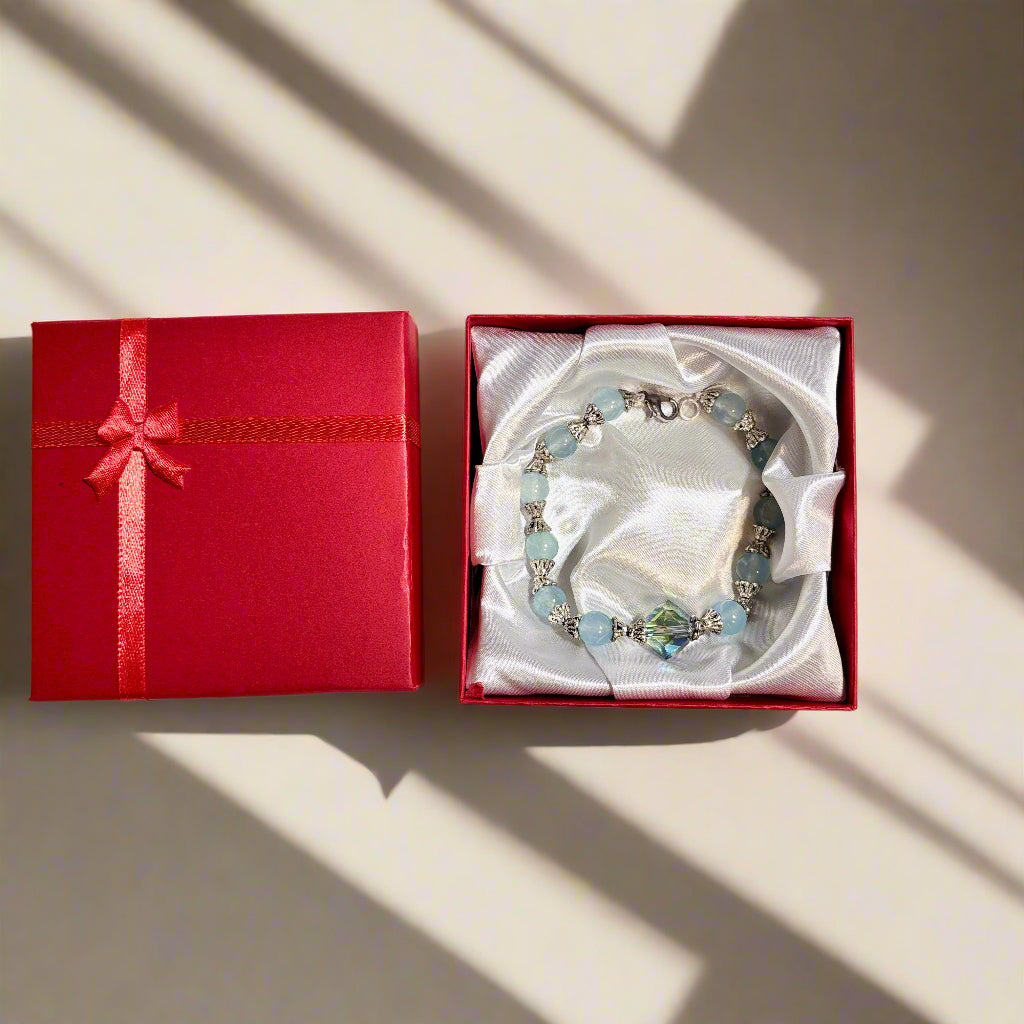 Handmade - Powder Blue Beaded Bracelet with a Center Faceted Blue Crystal