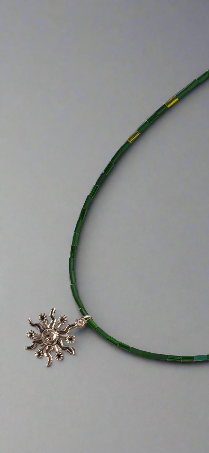 Necklace - Handmade Green Beaded Chain with Silver Tone Sunburst Pendant