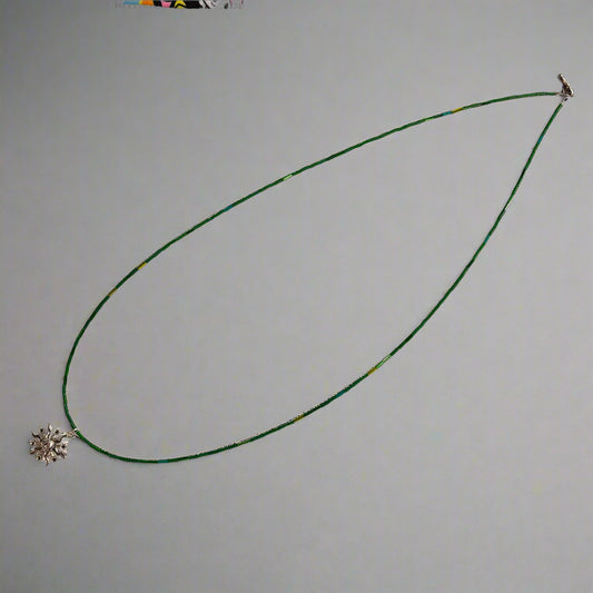 Necklace - Handmade Green Beaded Chain with Silver Tone Sunburst Pendant