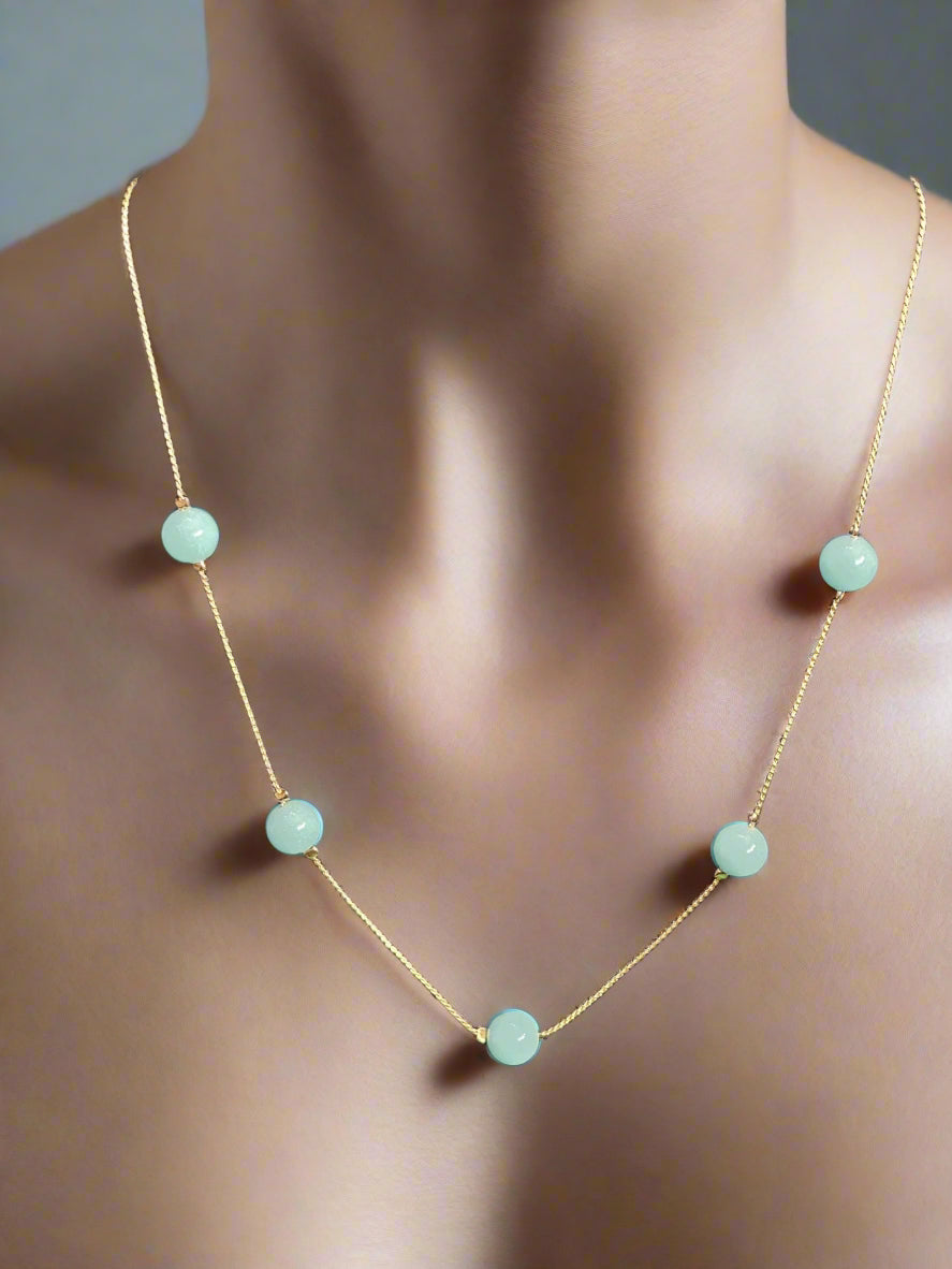 Necklace - Luminous Beads on a Delicate Chain