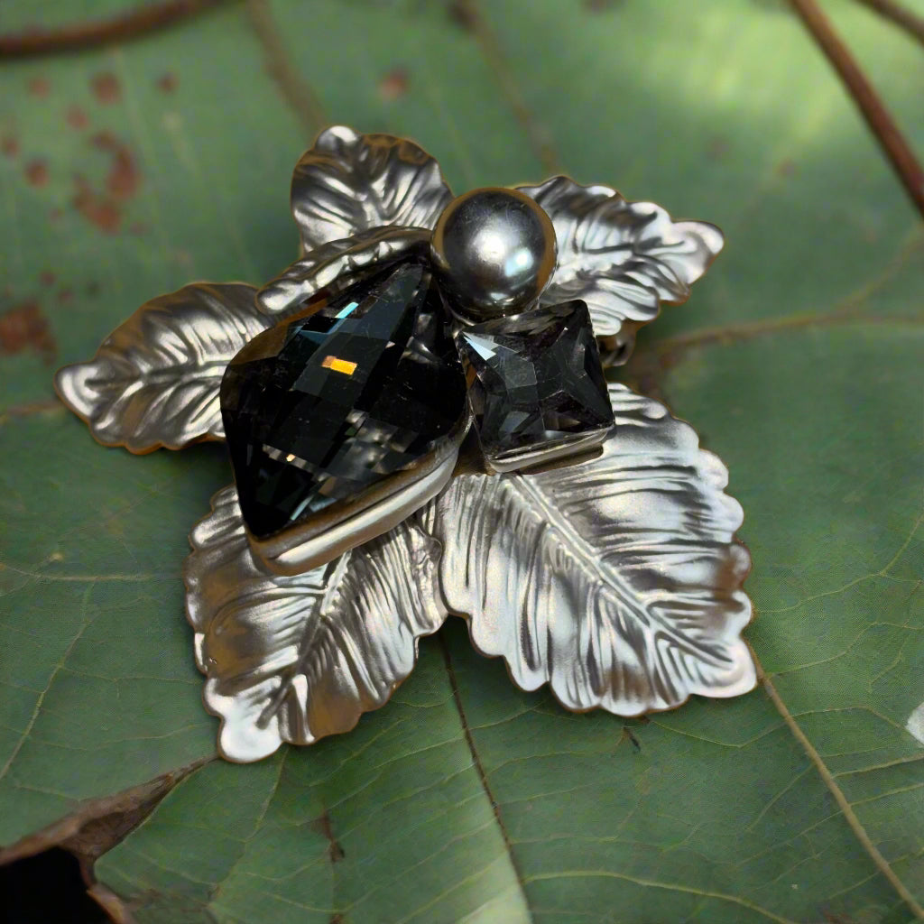 Brooch - Two Black Mirror Stones on Leaf