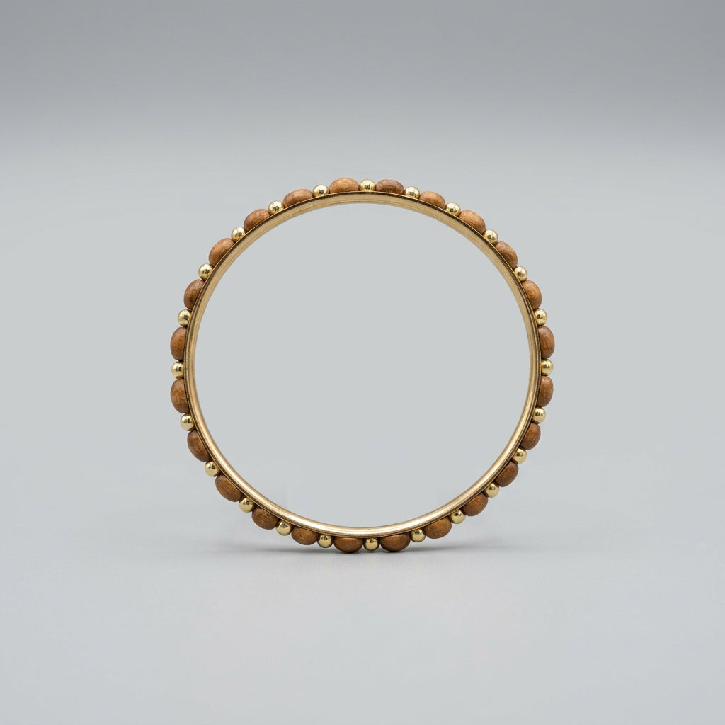 Bracelet - Polished Wooden Oval Beads - with Golden Spacer Beads - on a Gold Bangle