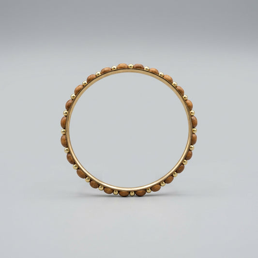 Bracelet - Polished Wooden Oval Beads - with Golden Spacer Beads - on a Gold Bangle