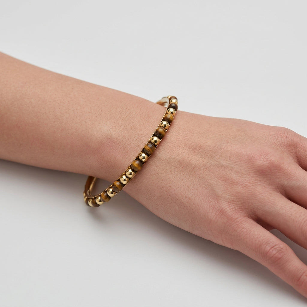 Bracelet - Polished Wooden Oval Beads - with Golden Spacer Beads - on a Gold Bangle