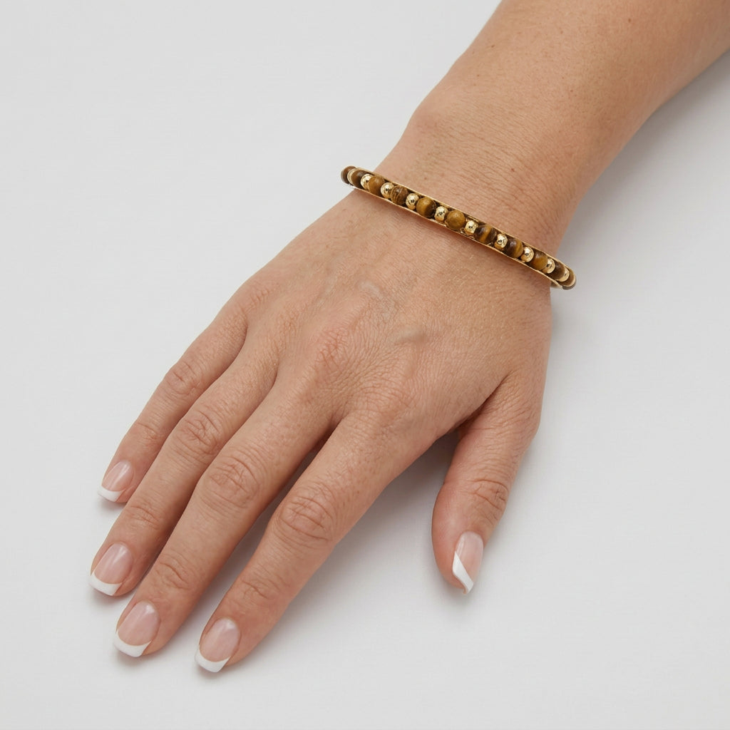 Bracelet - Polished Wooden Oval Beads - with Golden Spacer Beads - on a Gold Bangle
