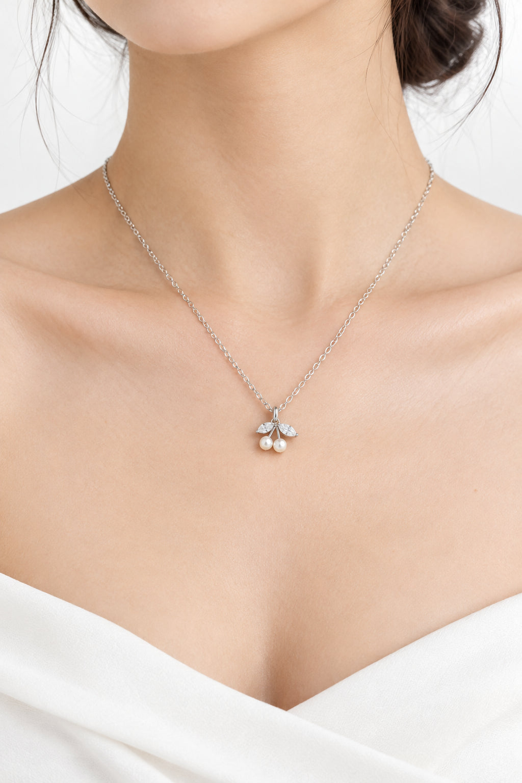 Necklace - Silver Tone - Adorned with - Two Faux Pearl Cherries - and Crystal Marquise - Leaves