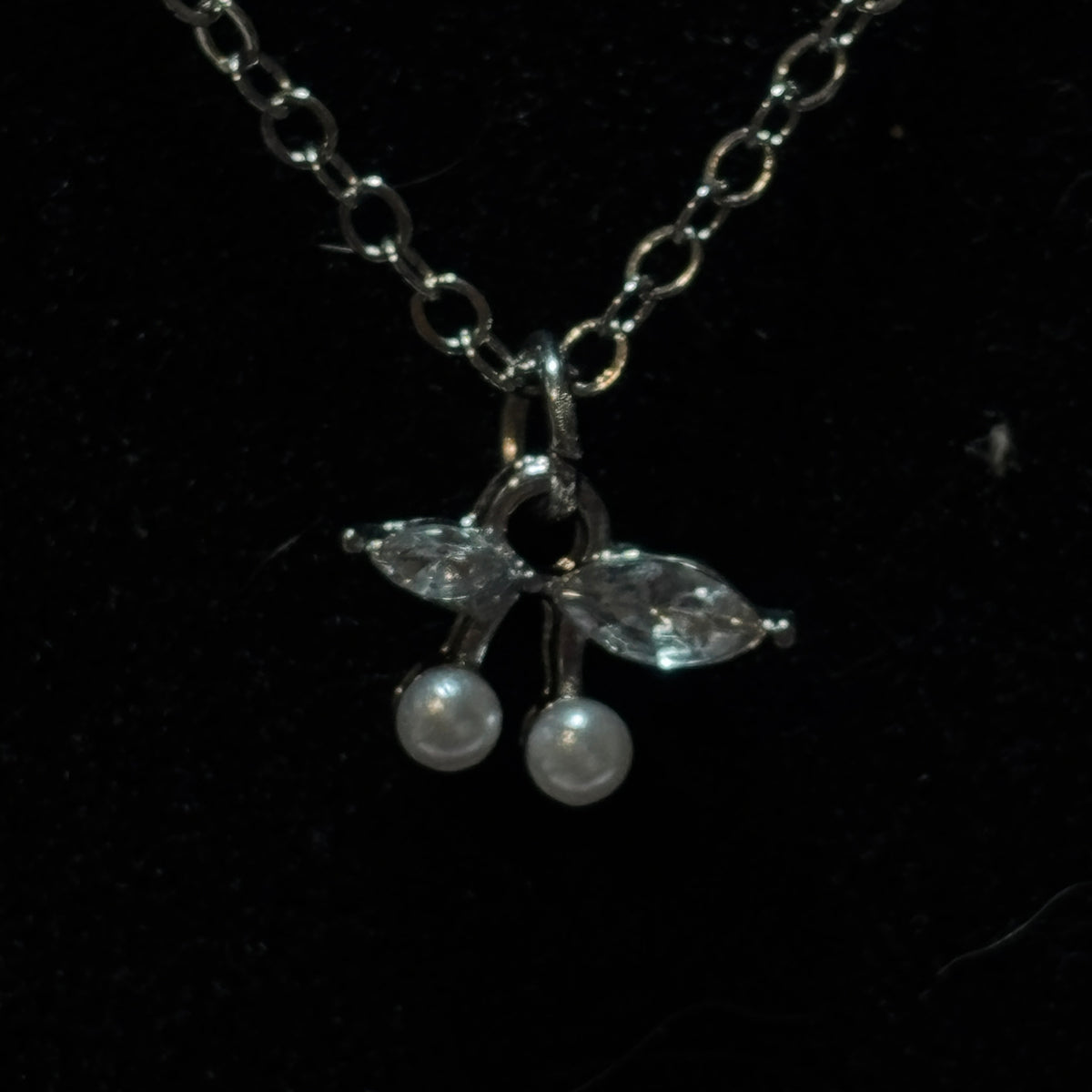 Necklace - Silver Tone - Adorned with - Two Faux Pearl Cherries - and Crystal Marquise - Leaves
