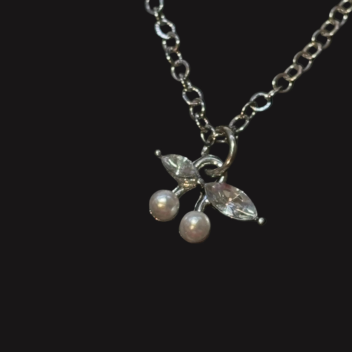 Necklace - Silver Tone - Adorned with - Two Faux Pearl Cherries - and Crystal Marquise - Leaves