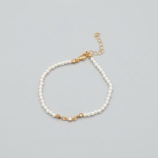 Bracelet - Tiny Faux Pearls - with a Transparent Center Quartz - and Gold Tone Lobster Clasp
