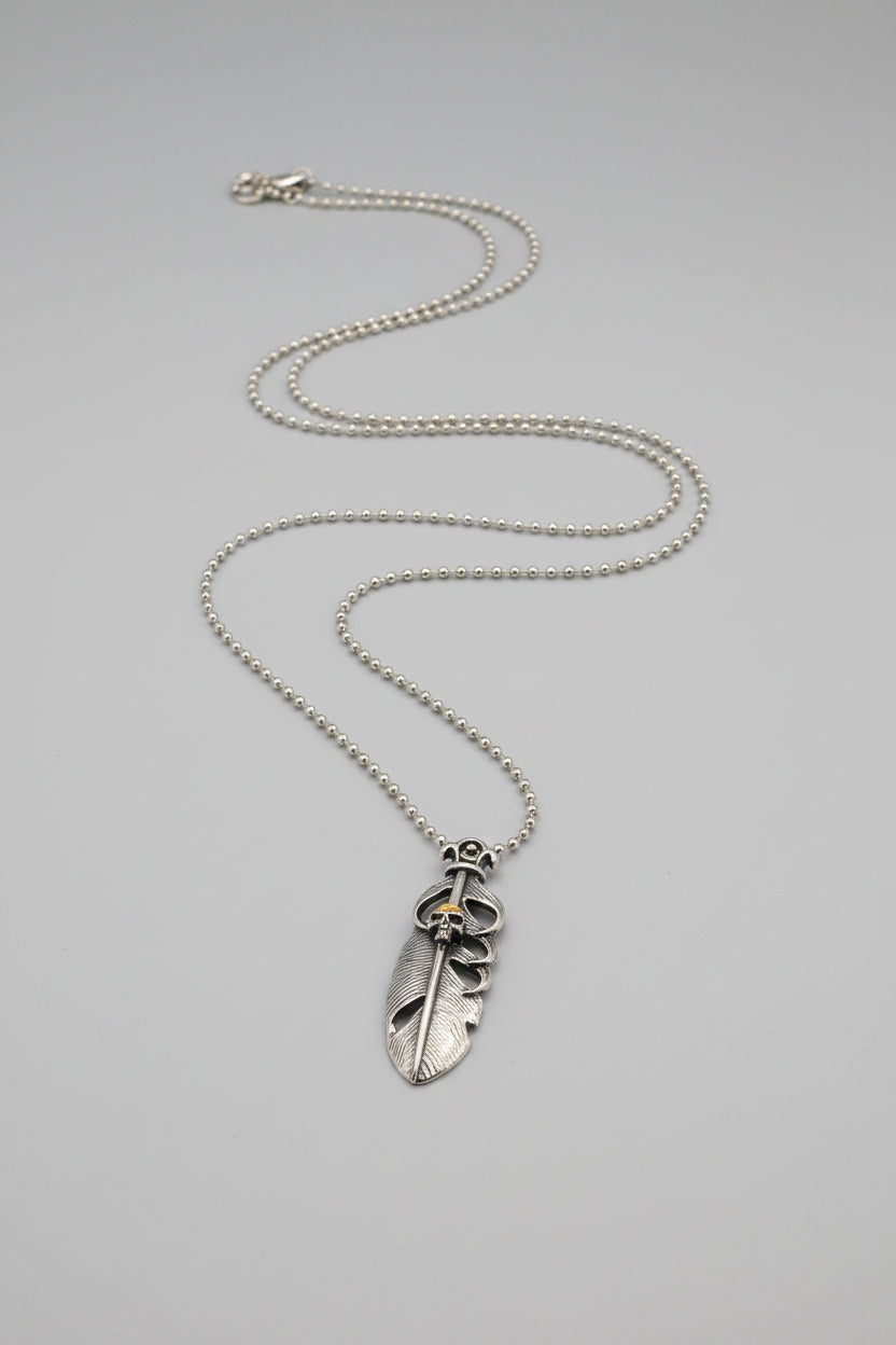 Necklace - Feather Shaped Pendant with Skull Motif