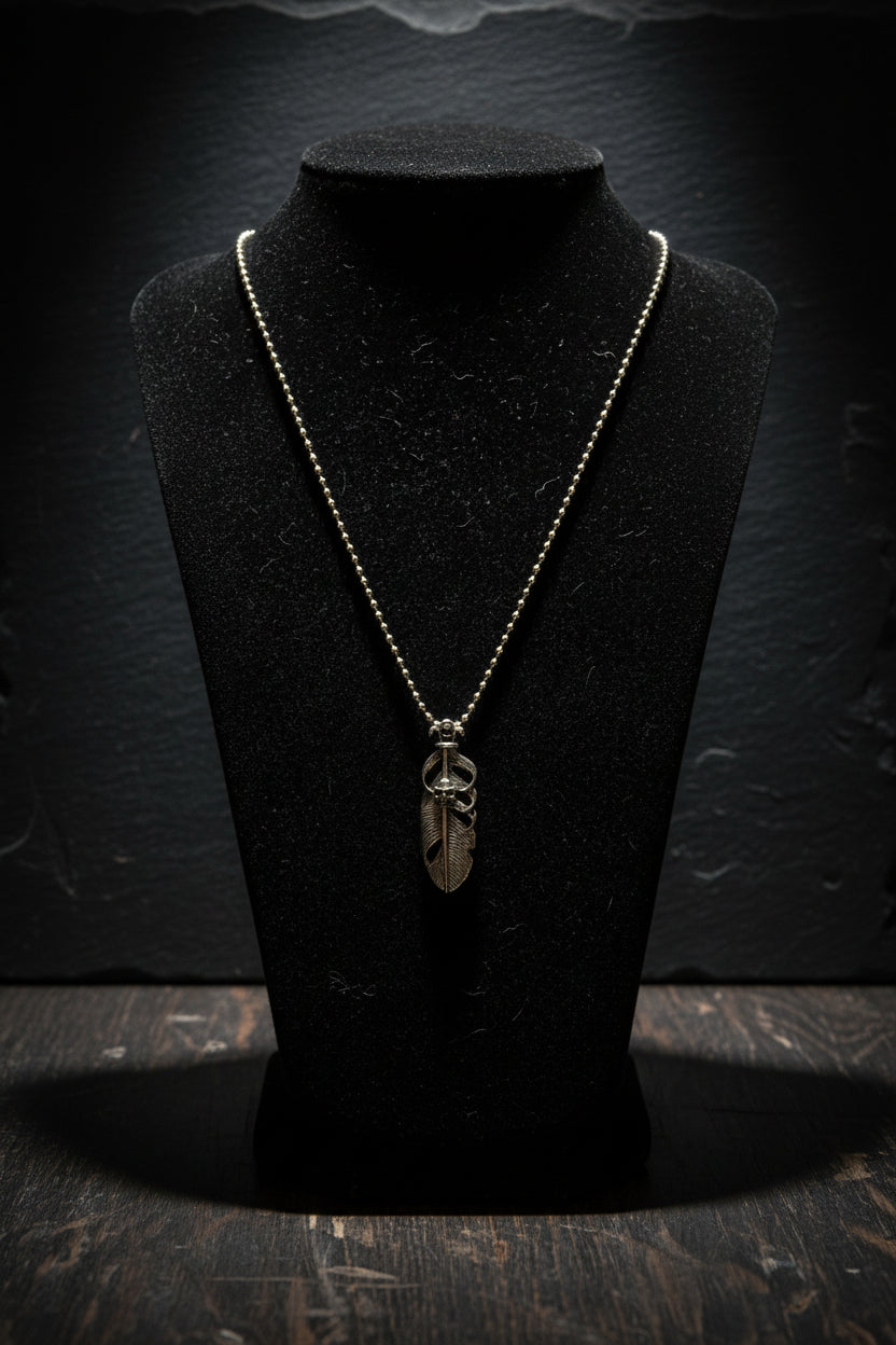Necklace - Feather Shaped Pendant with Skull Motif