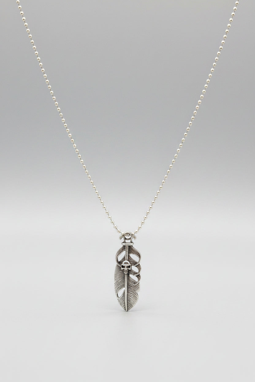 Necklace - Feather Shaped Pendant with Skull Motif