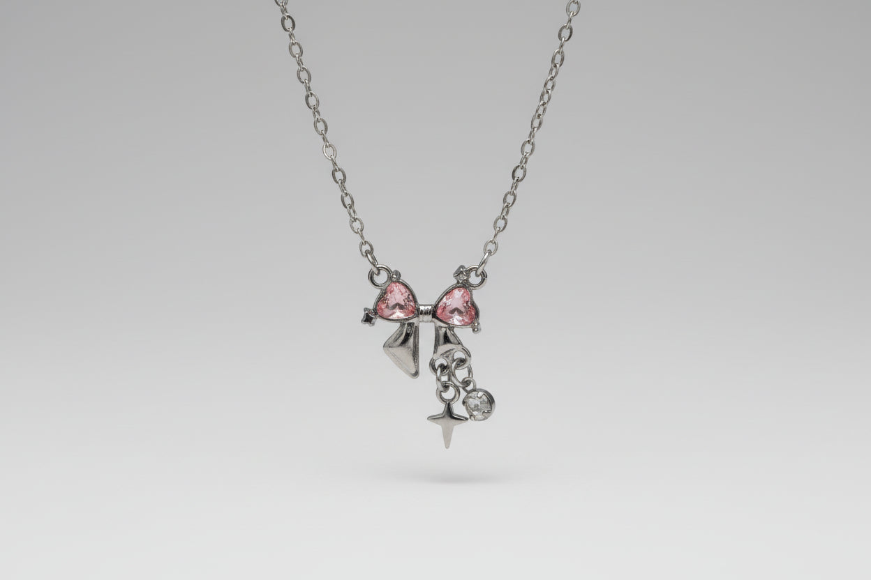Silver-Tone Bow Necklace with Pink Heart- Shaped Rhinestones