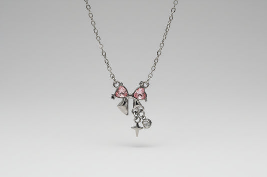 Silver-Tone Bow Necklace with Pink Heart- Shaped Rhinestones