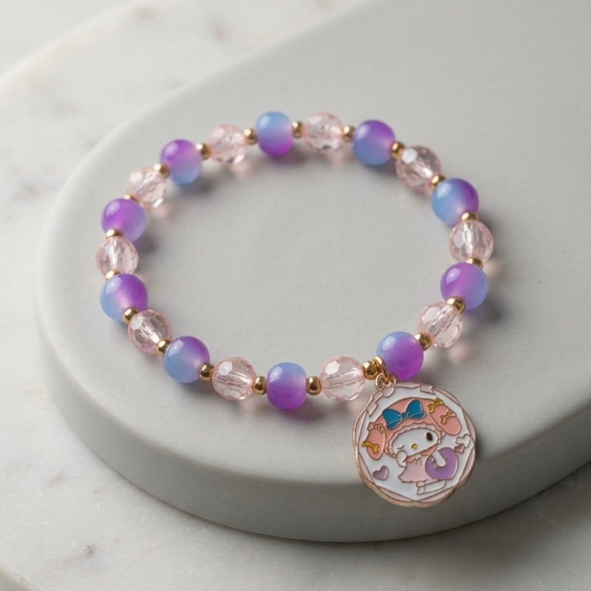 Bracelet - Stretch - Purple Pink Beads & Gold Spacer Beads & a My Melody Charm