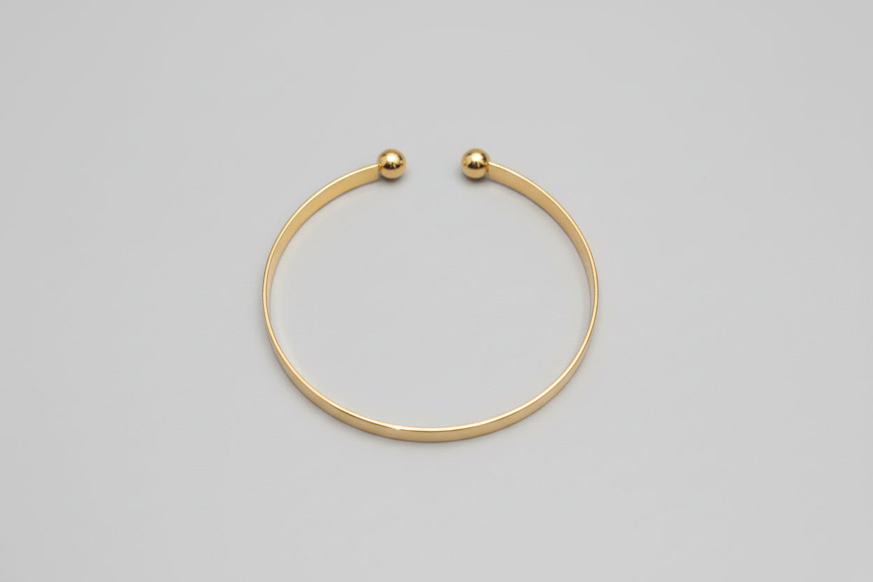 Bracelet - Gold Tone Bangle with Engraved Scrolling Pattern