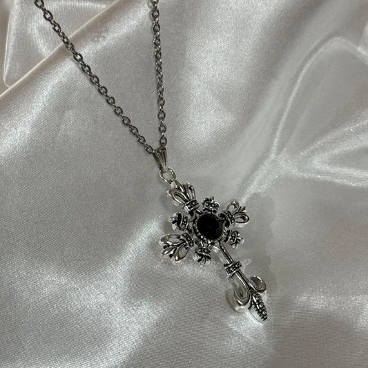 Necklace - Silver-Toned Fleur De Lis Cross featuring a Striking Black Gem