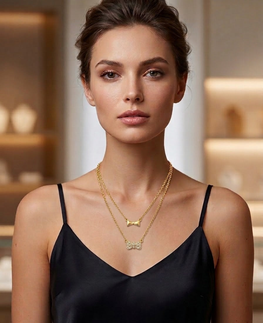 Double Bow Gold Tone Necklace Adorned with Rhinestones
