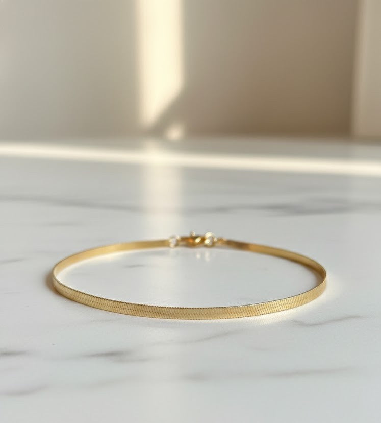 Elegant 7.5" Gold Tone Herringbone Chain Bracelet