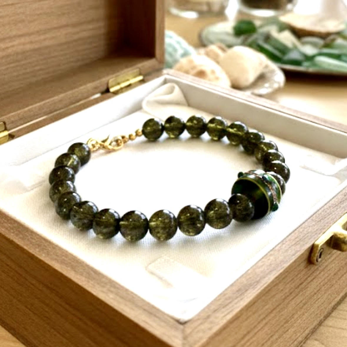Handmade - Dark Green Glass Beaded Bracelet with Striped Centerpiece Bead